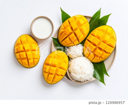creative flat lay of yellow mango 128986957