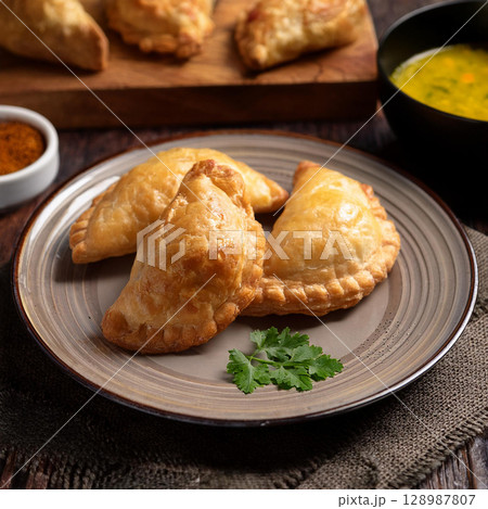 Crispy Curry Puff with Spicy Filling 128987807