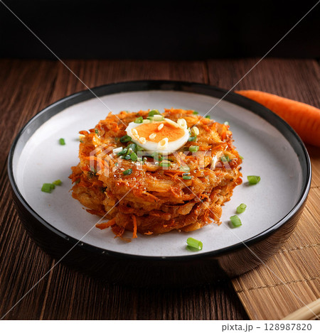 Delicious Fried Carrot Cake with Eggs Delicious Fried Carrot Cake with Eggs 128987820