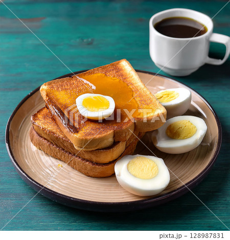 Kaya Toast with Butter and Soft Eggs Kaya Toast with Butter and Soft Eggs 128987831