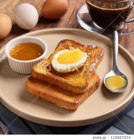 Kaya Toast with Butter and Soft Eggs Kaya Toast with Butter and Soft Eggs 128987834