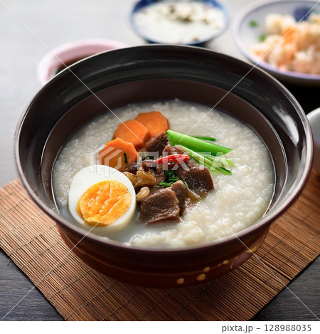 Hearty Teochew Porridge with Flavorful Sides 128988035