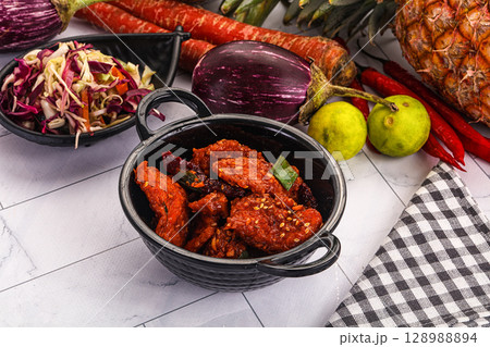 Indian cuisine - spicy Chicken 65 128988894