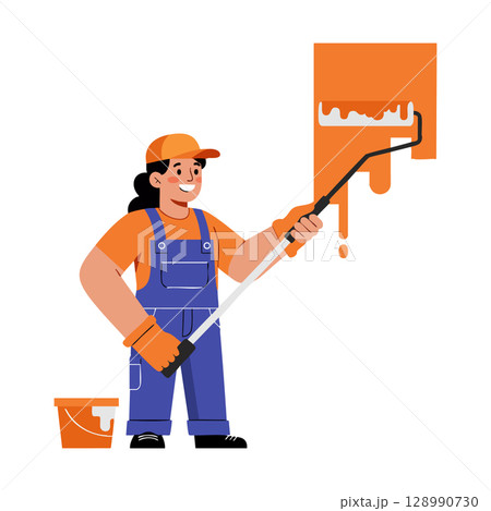 Female Painter Using Roller Brush Applying Orange Paint on Wall in Overalls and Cap 128990730