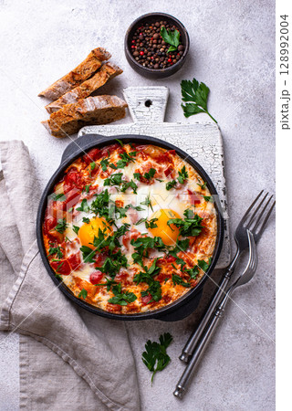 Shakshuka, traditional Jewish breakfast dish Shakshuka, traditional Jewish breakfast dish 128992004