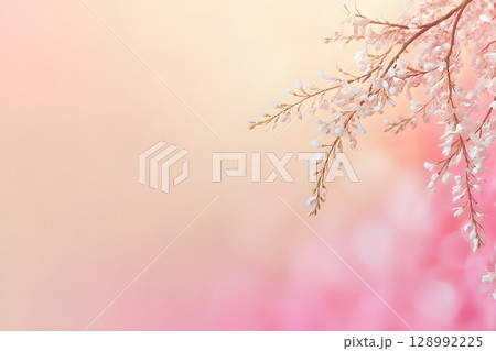 Delicate blossoms in soft pink and white create a gentle background, perfect for celebrating mothers and special days. 128992225
