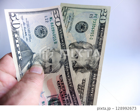 Close-up cash, 100 hundred dollar bills, 50 dollar bills, 20 dollar bills Close-up cash, 100 hundred dollar bills, 50 dollar bills, 20 dollar bills 128992673