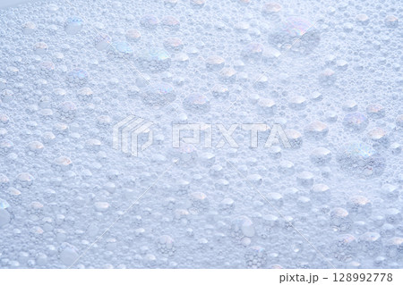 Soap foam with bubbles. The texture of the cleansing product. 128992778