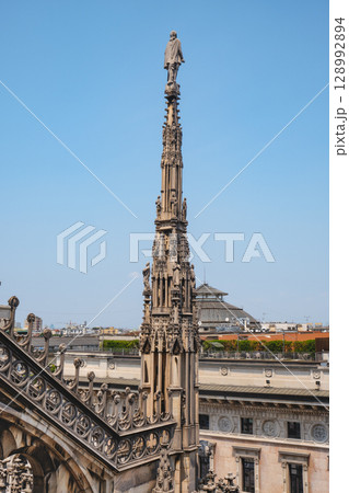 a pinnacle rises over Milan and the Galleria a pinnacle rises over Milan and the Galleria 128992894