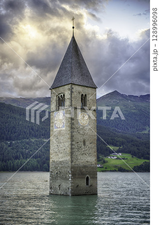 The iconic submerged Church Tower of Graun, Lake Reschensee, Italy 128996098