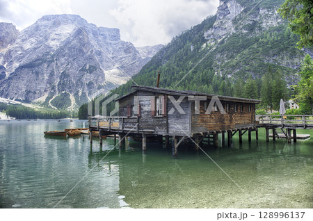 Wooden boat house on the scenic Lake Braies, Dolomites, Italy Wooden boat house on the scenic Lake Braies, Dolomites, Italy 128996137