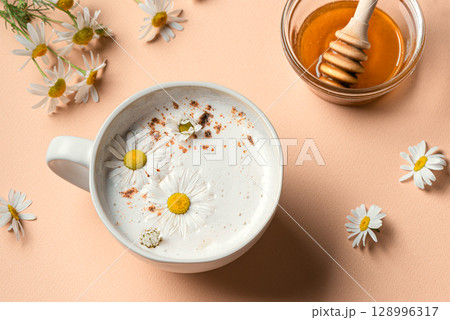 Chamomile moon milk, chamomile and honey tea latte 128996317