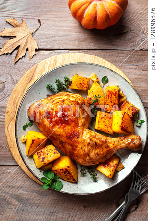 Autumn meal: roasted chicken and pumpkin Autumn meal: roasted chicken and pumpkin 128996326