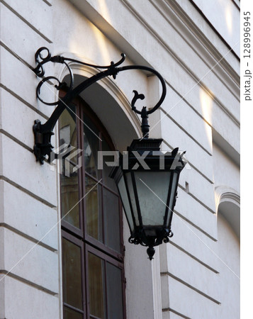 street lamp on old town city street Warsaw Poland street lamp on old town city street Warsaw Poland 128996945
