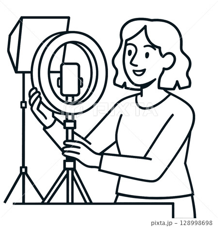 Creating content for photo of person using ring lightA person is setting upline art illustration 128998698