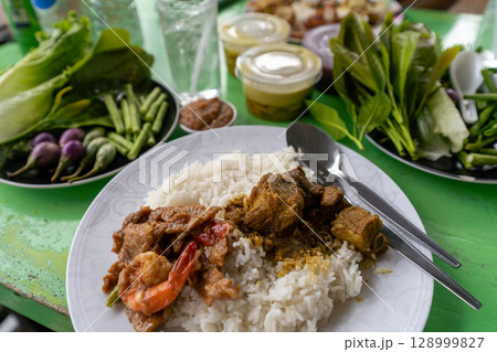Street food available 24 hours a day, rice and pork and shrimp cooked Street food available 24 hours a day, rice and pork and shrimp cooked 128999827