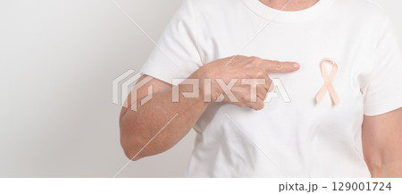 Elderly woman with Peach Ribbon for September Uterine Cancer Awareness month, Endometrial Cancer, Gynecologic, Uterus and Ovaries, Endometriosis, June Vaginal cancer and World cancer day concept Elderly woman with Peach Ribbon for September Uterine Cancer Awareness month, Endometrial Cancer, Gynecologic, Uterus and Ovaries, Endometriosis, June Vaginal cancer and World cancer day concept 129001724