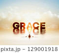 Christian rowing on the sea of grace with bright light, concept of God's grace, background with the word GRACE of grace 129001918