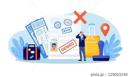 Open passport with stamp denied on travel visa, luggage, frustrated emigrant. Depressed man upset about refused entry. Travel abroad rejected. International vacation or emigration procedure 129003240