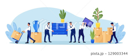 Moving to new apartment. Home relocation. Delivery company services. Loaders in overalls taking home appliances, goods, plants out of apartment. Movers carrying cardboard boxes, assembling furniture Moving to new apartment. Home relocation. Delivery company services. Loaders in overalls taking home appliances, goods, plants out of apartment. Movers carrying cardboard boxes, assembling furniture 129003344