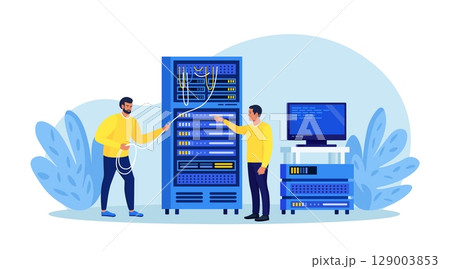 System administrator upkeeping server, adjusting network, PC hardware. Sysadmin repairing computer. Administration, data center maintenance service. Repairman doing technical work with server rack 129003853