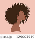 Curly-Haired Silhouette on Pink Background 129003910
