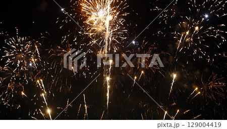 Golden Firework celebrate anniversary independence day night time celebrate national holiday. Countdown to new year 2024 party time event. Happy new year 2024, 4th of july holiday festival concept Golden Firework celebrate anniversary independence day night time celebrate national holiday. Countdown to new year 2024 party time event. Happy new year 2024, 4th of july holiday festival concept 129004419