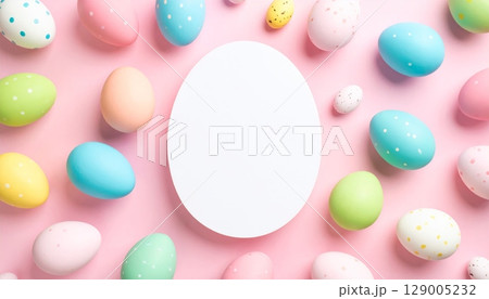 Colorful decorated Easter eggs with a floral design create a festive spring holiday border on a white background 129005232