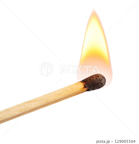 A macro shot captures a bright red and orange flame on a wooden matchstick burning against a clean black background A macro shot captures a bright red and orange flame on a wooden matchstick burning against a clean black background 129005584