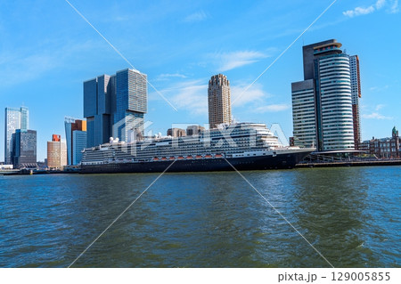 Spectacular Cruise Ship Docked in Rotterdam, Netherlands with Modern Architecture Backdrop 129005855