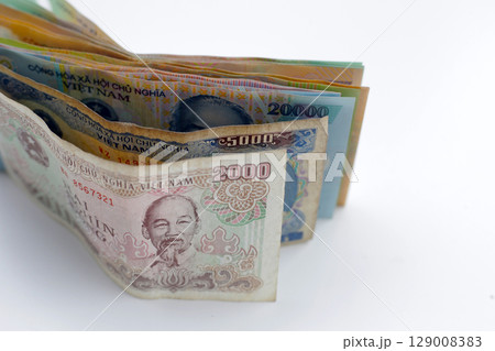 Vietnamese dong banknotes. Money concept Vietnamese dong banknotes. Money concept 129008383
