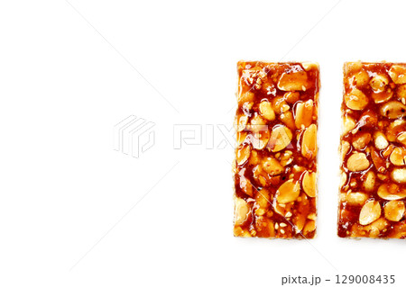 Peanut bars with sweet caramel Peanut bars with sweet caramel 129008435
