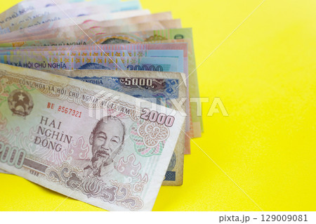 Vietnamese dong banknotes. Money concept Vietnamese dong banknotes. Money concept 129009081