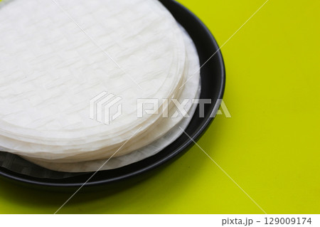 Stacked round sheets of Vietnamese rice paper Stacked round sheets of Vietnamese rice paper 129009174
