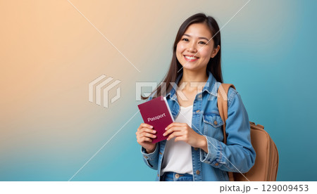 Happy young Asian woman traveler holding passport with backpack smiling confidently on colorful background 129009453