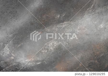Rough gray concrete surface with natural rust and texture variations for industrial design 129010295