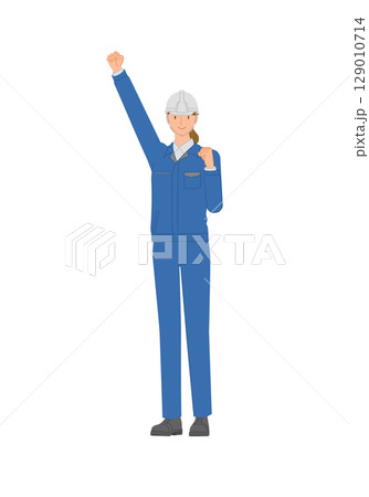 ビジネスイメージ：作業服とヘルメットを身に付けた笑顔の若い女性：腕を上げてガッツポーズ 129010714