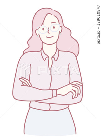 A confident young woman in a business outfit with arms crossed, projecting strength 129010947