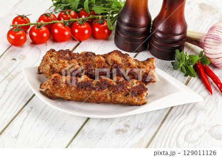 Chicken kebab minced meat and spices 129011126