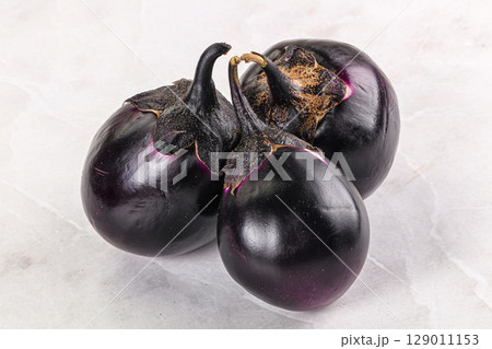 Raw violet and black eggplant 129011153