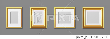 Gold photo frames collection on gray wall 129011764