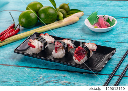 Japanese cuisine - sushi with octopus 129012160