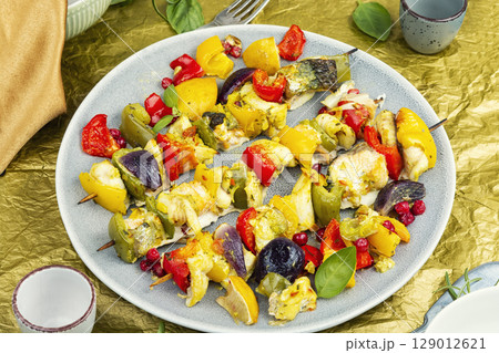 Grilled fish skewers, healthy meal. 129012621