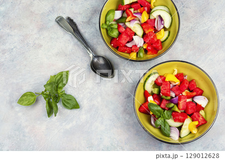 Original healthy salad of watermelon, cucumber. 129012628