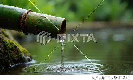 fresh water in a spoon fresh water in a spoon 129014214