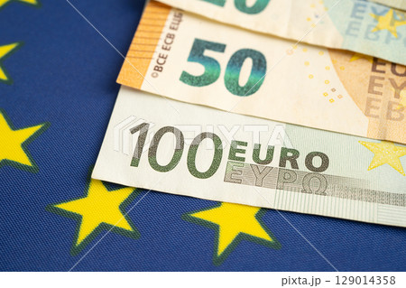 Euro banknote and coin, Europe money, economy finance exchange trade investment. 129014358