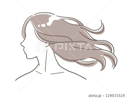 美しい長い髪が風になびいている女性の横顔 129015329