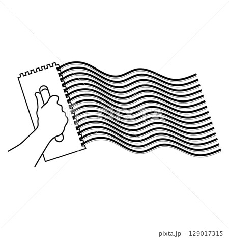 Notched trowel in hand applies waves of plaster glue Notched trowel in hand applies waves of plaster glue 129017315