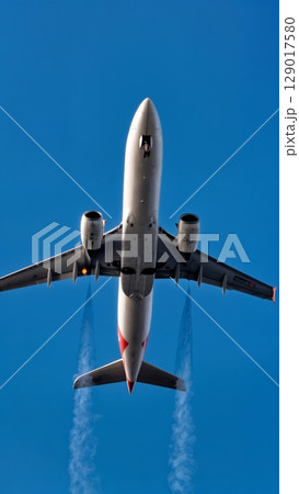 Airplane Takeoff, Dynamic Start, Ascent, Momentum. Ideal for motivational content, business launch, sports themes, vertical shot 129017580