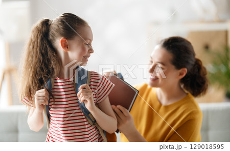 Happy family preparing for school 129018595